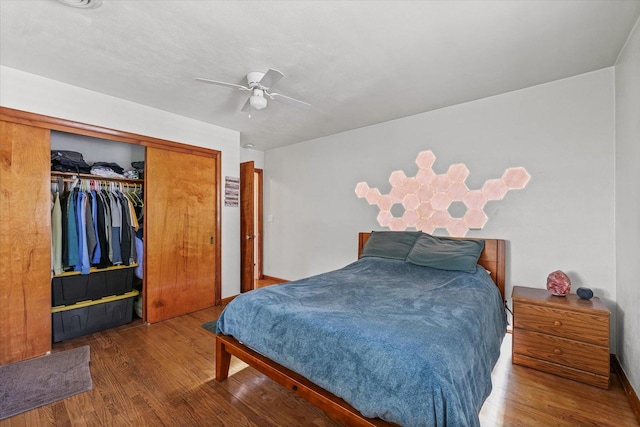 205 Buena Vista Dr, Champaign, IL 61820 - bedroom featuring wood finished floors, a closet, and a ceiling fan