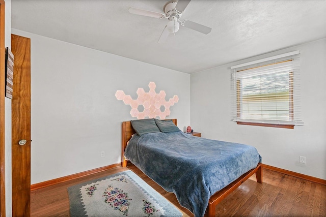 205 Buena Vista Dr, Champaign, IL 61820 - bedroom with wood finished floors and a ceiling fan