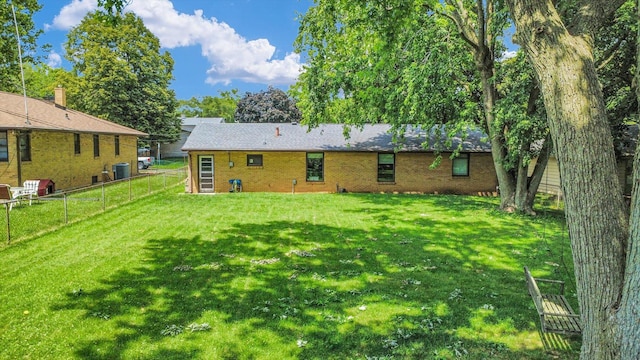 205 Buena Vista Dr, Champaign, IL 61820 - rear view of house featuring brick siding