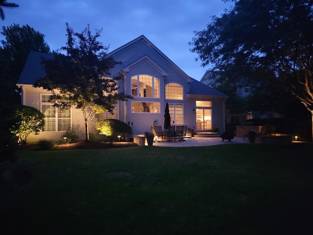 424 Bluegrass Ln, Geneva, IL 60134 - back of property with a patio area and a lawn