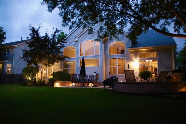 424 Bluegrass Ln, Geneva, IL 60134 - rear view of house featuring a patio and a lawn