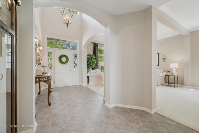 424 Bluegrass Ln, Geneva, IL 60134 - living room with high vaulted ceiling, a ceiling fan, dark wood-style floors, a glass covered fireplace, and recessed lighting