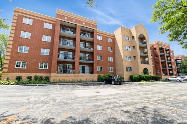 59 S Hale St Unit 203, Palatine, IL 60067 - view of apartment building / complex with uncovered parking