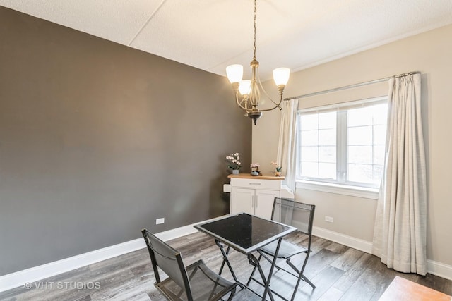 59 S Hale St Unit 203, Palatine, IL 60067 - dining space with a chandelier and wood finished floors