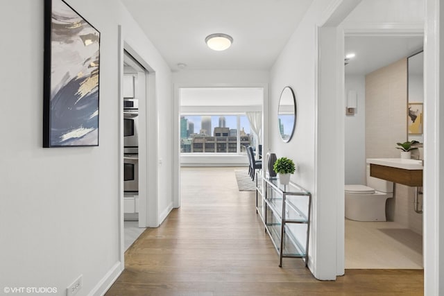 161 E Chicago Ave Unit 27C, Chicago, IL 60611 - hall with wood finished floors
