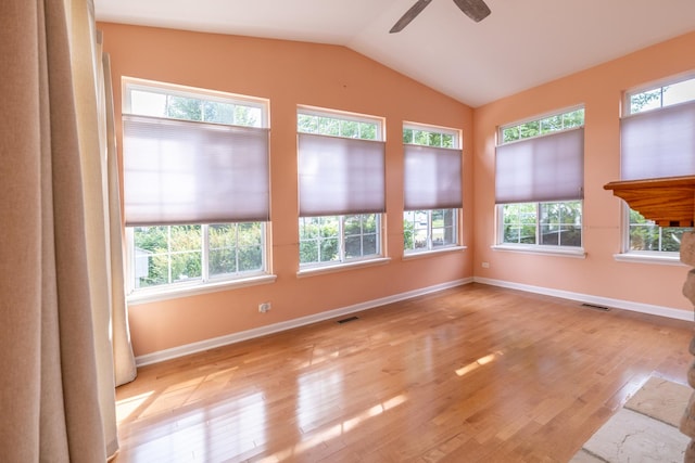 424 Riverbend Dr, Genoa, IL 60135 - unfurnished sunroom with healthy amount of natural light, lofted ceiling, and hardwood / wood-style floors