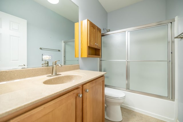 424 Riverbend Dr, Genoa, IL 60135 - bathroom with vanity, tile patterned floors, and enclosed tub / shower combo