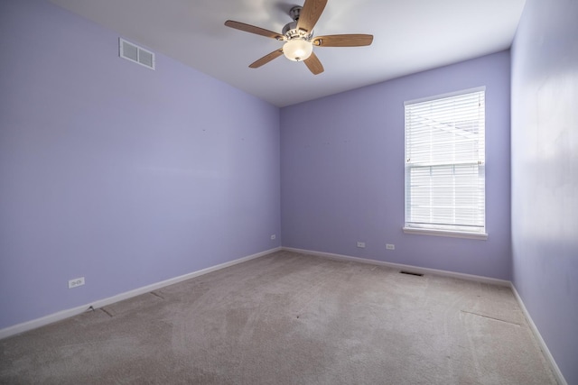 424 Riverbend Dr, Genoa, IL 60135 - carpeted spare room with ceiling fan and baseboards