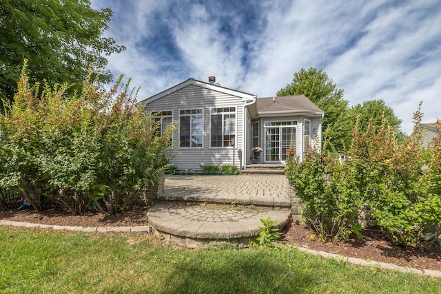 424 Riverbend Dr, Genoa, IL 60135 - back of property featuring a patio area