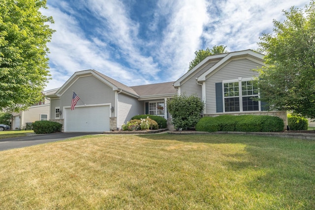 424 Riverbend Dr, Genoa, IL 60135 - ranch-style home featuring asphalt driveway, a garage, a front lawn, and stone siding