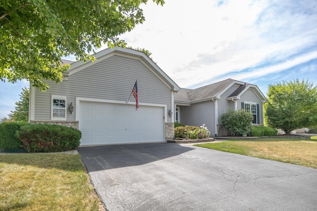 424 Riverbend Dr, Genoa, IL 60135 - single story home with driveway, a garage, stone siding, and a front lawn