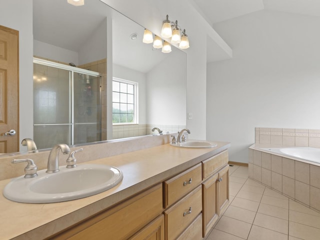 16107 Carlow Cir, Manhattan, IL 60442 - bathroom featuring vaulted ceiling, tile patterned flooring, a shower stall, double vanity, and a bath
