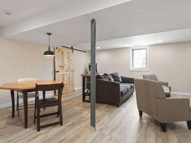 16107 Carlow Cir, Manhattan, IL 60442 - living area with a barn door, light wood-type flooring, and recessed lighting