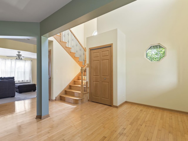 16107 Carlow Cir, Manhattan, IL 60442 - staircase with hardwood / wood-style flooring and ceiling fan