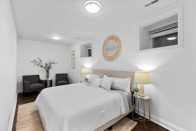 506 W Oakdale Ave Unit 1, Chicago, IL 60657 - bedroom with baseboards and wood finished floors