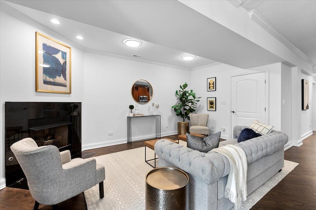 506 W Oakdale Ave Unit 1, Chicago, IL 60657 - living room with crown molding, dark wood finished floors, recessed lighting, and a tiled fireplace