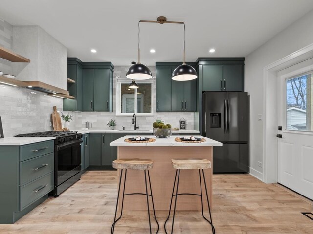 2640 N 76th Ct, Elmwood Park, IL 60707 - kitchen with open shelves, refrigerator with ice dispenser, green cabinetry, black range with gas cooktop, and recessed lighting
