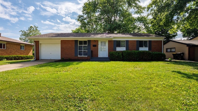 17 Kingswood Dr, Normal, IL 61761 - ranch-style home featuring a garage, driveway, brick siding, and a front lawn