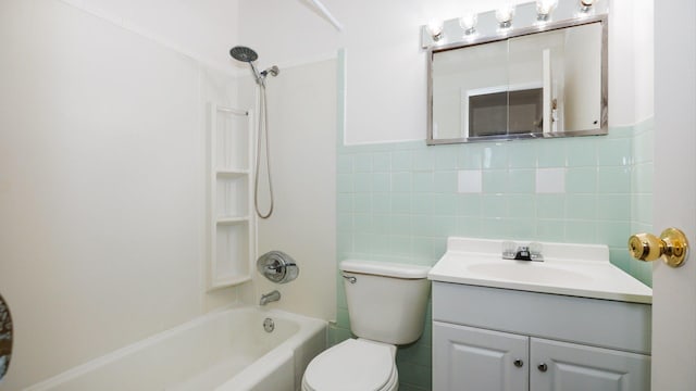 17 Kingswood Dr, Normal, IL 61761 - full bath with vanity, shower / bath combination, tile walls, and a wainscoted wall