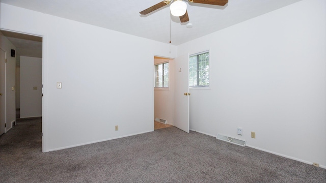 17 Kingswood Dr, Normal, IL 61761 - carpeted spare room with ceiling fan and baseboards