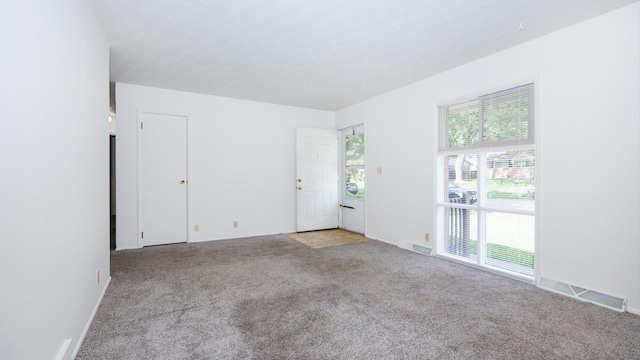 17 Kingswood Dr, Normal, IL 61761 - spare room featuring light carpet