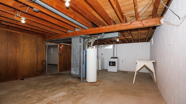 17 Kingswood Dr, Normal, IL 61761 - unfinished below grade area with independent washer and dryer, water heater, and concrete block wall
