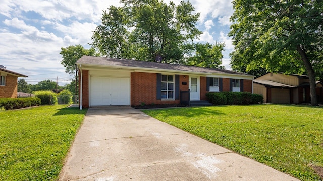 17 Kingswood Dr, Normal, IL 61761 - ranch-style house with brick siding, an attached garage, and driveway