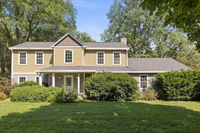 436 Cambridge Way, Bolingbrook, IL 60440 - view of front of property with a chimney, a front lawn, and a shingled roof