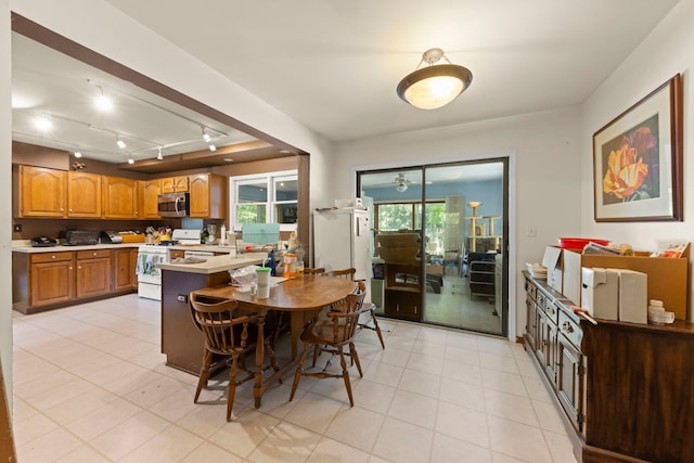 436 Cambridge Way, Bolingbrook, IL 60440 - dining space featuring light tile patterned floors and track lighting