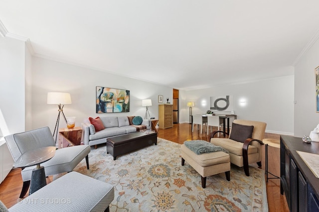 1325 N State Pkwy Unit 6D, Chicago, IL 60610 - living room featuring ornamental molding and light wood finished floors