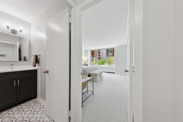 1325 N State Pkwy Unit 6D, Chicago, IL 60610 - bathroom with baseboards and vanity