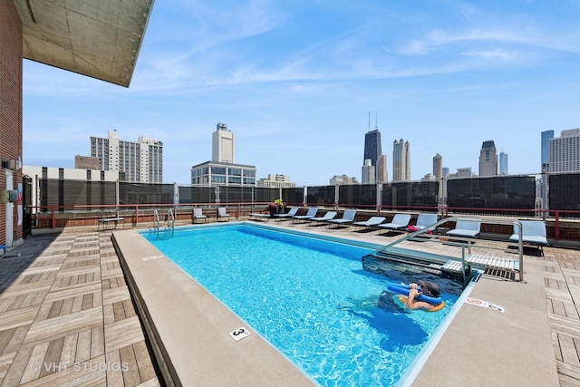 1325 N State Pkwy Unit 6D, Chicago, IL 60610 - community pool with a view of skyline and a patio area