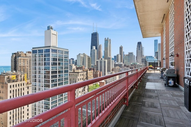 1325 N State Pkwy Unit 6D, Chicago, IL 60610 - balcony featuring a view of skyline and a grill