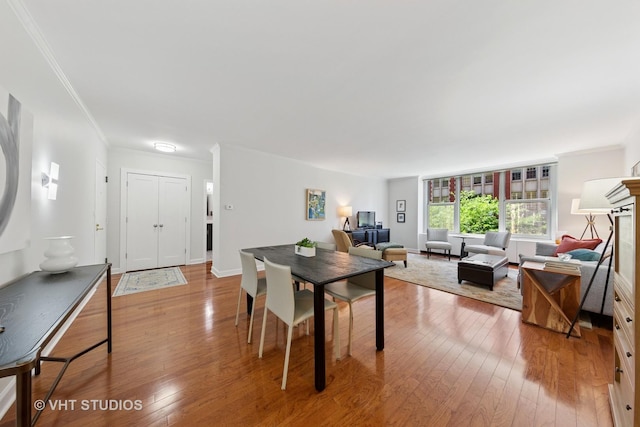 1325 N State Pkwy Unit 6D, Chicago, IL 60610 - dining area with wood-type flooring and crown molding