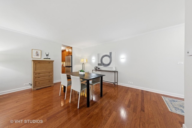 1325 N State Pkwy Unit 6D, Chicago, IL 60610 - dining space with wood finished floors and ornamental molding