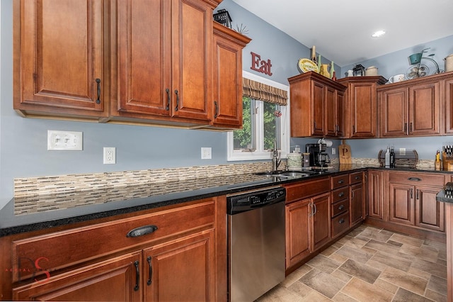 1315 W Jackson St, Ottawa, IL 61350 - kitchen featuring dishwasher, brown cabinetry, dark stone countertops, and stone finish floors