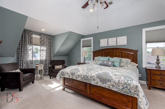 1315 W Jackson St, Ottawa, IL 61350 - bedroom featuring light colored carpet, vaulted ceiling, multiple windows, and ceiling fan