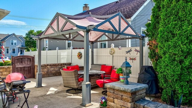 1315 W Jackson St, Ottawa, IL 61350 - view of patio with grilling area and a gate
