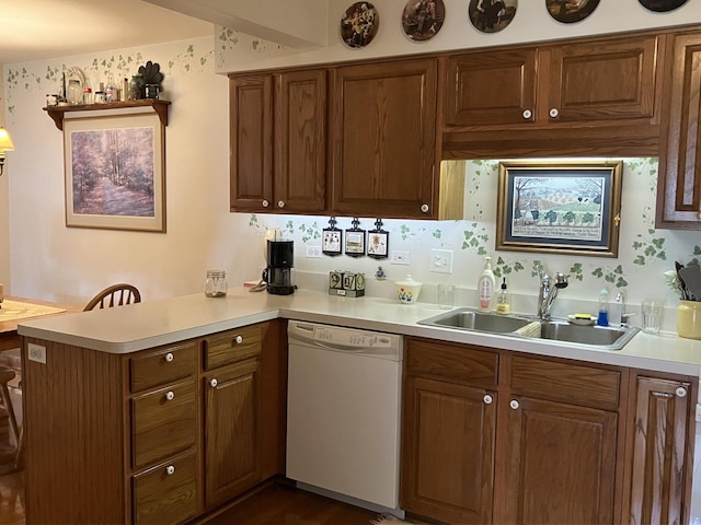1669 Saint Ann Dr, Hanover Park, IL 60133 - kitchen with white dishwasher, a peninsula, light countertops, and brown cabinets