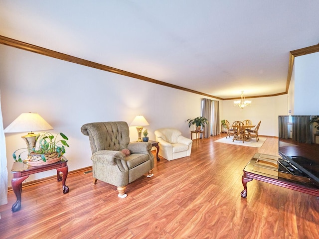 7201 W 110th St, Worth, IL 60482 - living area featuring ornamental molding, light wood finished floors, and a chandelier