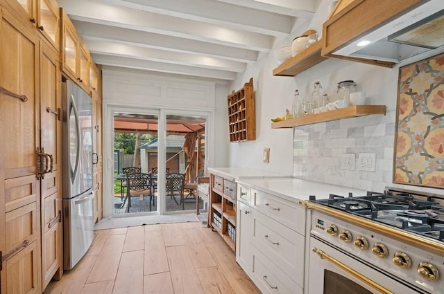 32 Valley Rd, Highland Park, IL 60035 - kitchen with open shelves, range hood, appliances with stainless steel finishes, beam ceiling, and tasteful backsplash