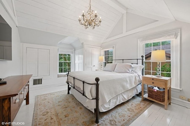 32 Valley Rd, Highland Park, IL 60035 - bedroom featuring a chandelier and light wood finished floors