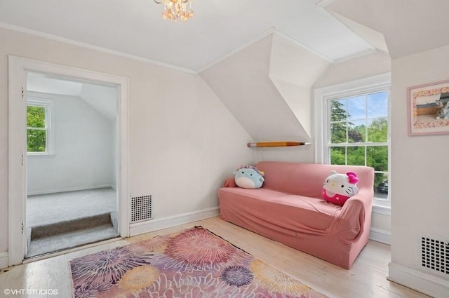 32 Valley Rd, Highland Park, IL 60035 - sitting room with vaulted ceiling, wood finished floors, and ornamental molding