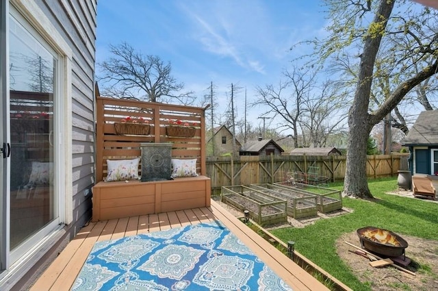 32 Valley Rd, Highland Park, IL 60035 - deck featuring an outdoor fire pit, a garden, and a fenced backyard