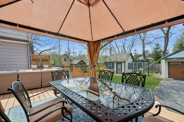 32 Valley Rd, Highland Park, IL 60035 - fenced backyard featuring outdoor dining area, an outdoor structure, an outdoor hangout area, a patio, and a residential view