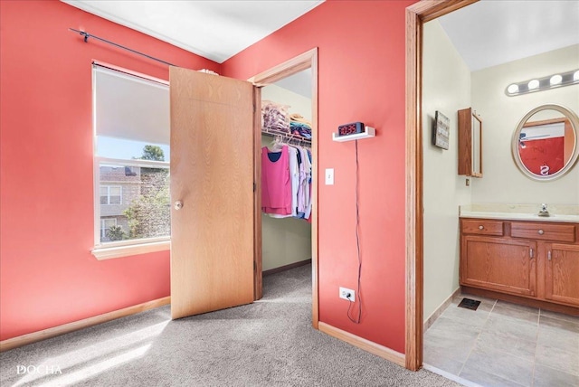 2006 Westmore Grove Dr, Plainfield, IL 60586 - corridor with baseboards and light carpet