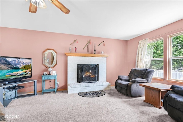 2006 Westmore Grove Dr, Plainfield, IL 60586 - carpeted living area featuring a fireplace and ceiling fan