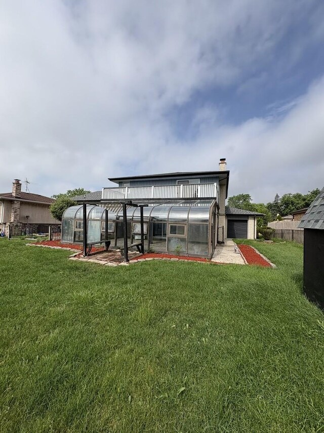 13623 S 84th Ave, Orland Park, IL 60462 - back of house featuring a greenhouse, an outbuilding, and a chimney