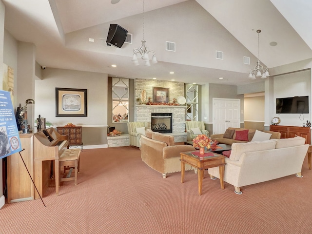 1664 Windsor Rd, Pingree Grove, IL 60140 - living room with a chandelier, light carpet, high vaulted ceiling, and a fireplace
