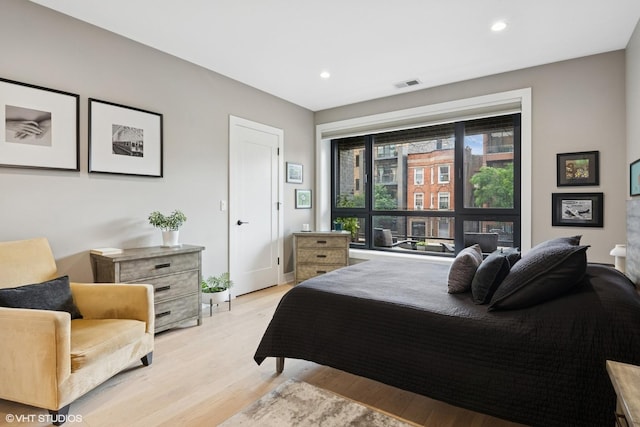 1523 N Western Ave Unit 2A, Chicago, IL 60622 - bedroom with light wood-style floors and recessed lighting